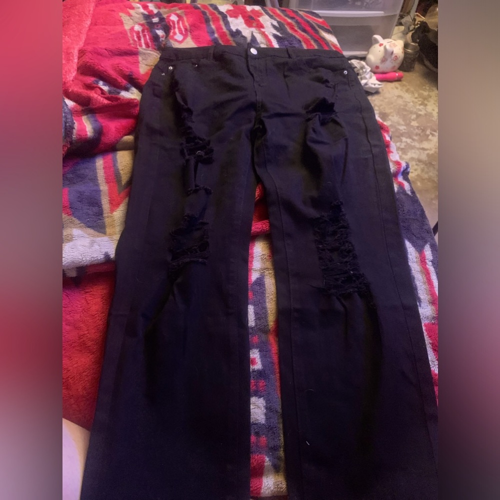 black straight leg ripped jeans.